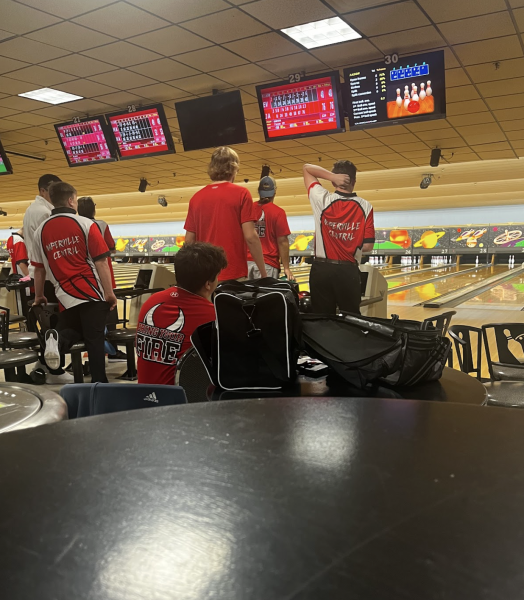 Seniors Owen Stamer, Joao Lourenco, and Jack Copeland facing Naperville Central.
